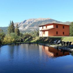 Villa with Bio Swimming Lake Image
